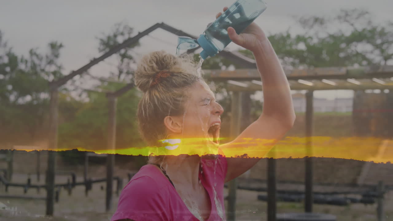 Pouring water over herself, woman with sunset landscape animation overlay