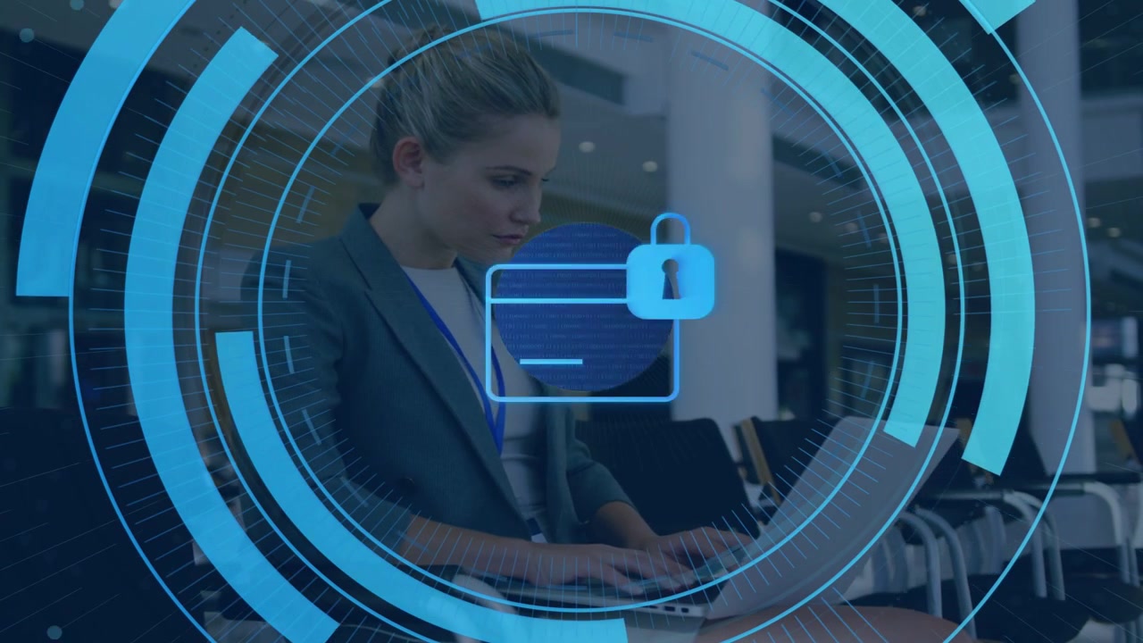 Executive typing on laptop in atrium, starting rotating HUD card padlock overlaying laptop security