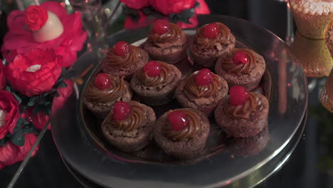 Dessert-bar-with-chocolate-and-cherry-cupcakes