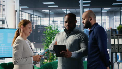 vertical video diverse group of ceos applying data analysis and strategic thinking