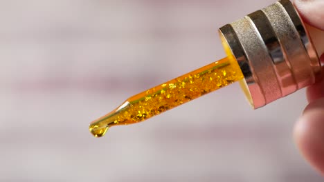 gold serum dropper bottle