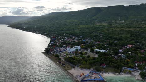 oslob’s coast, so calm and deep, cradles the night as world falls asleep