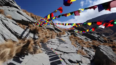 mountain path with prayer flags