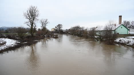 river flood at the floodplains in europe winter