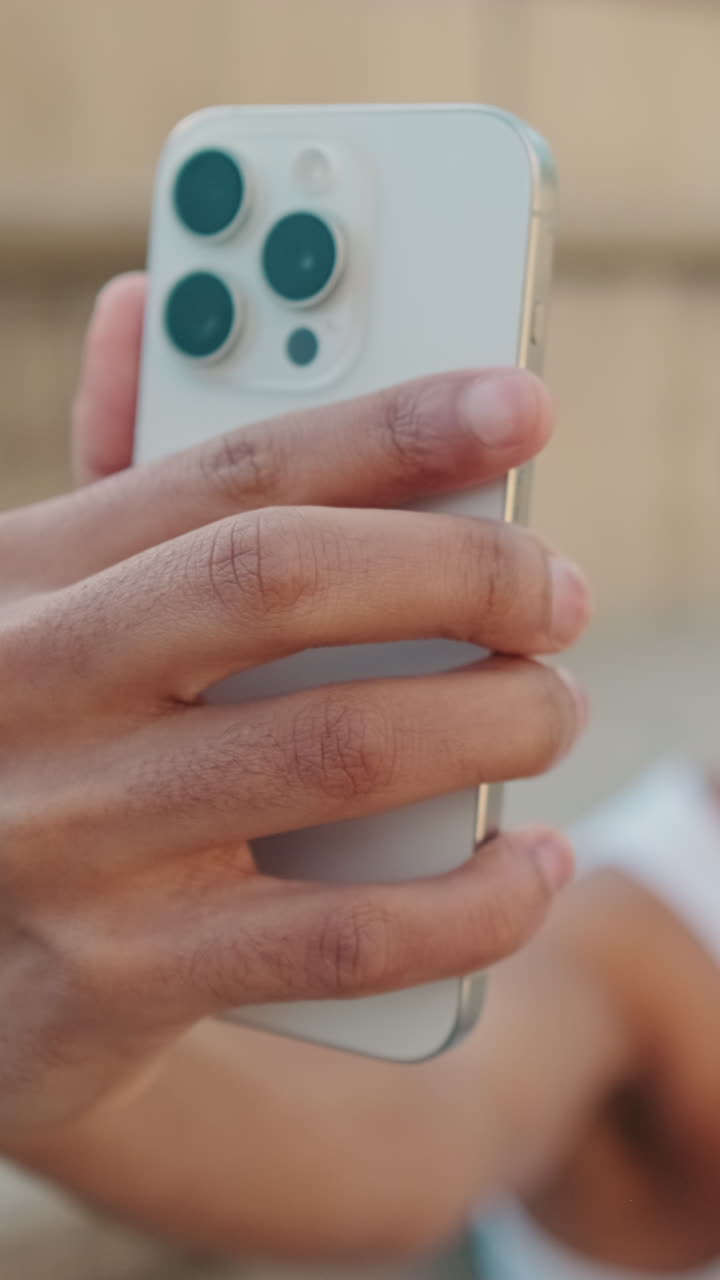 Close-up of a Hand Holding a Modern Smartphone