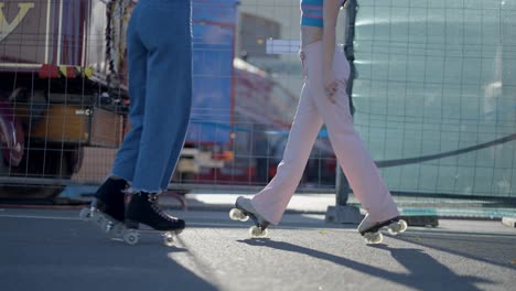 group of friends roller skating in the city