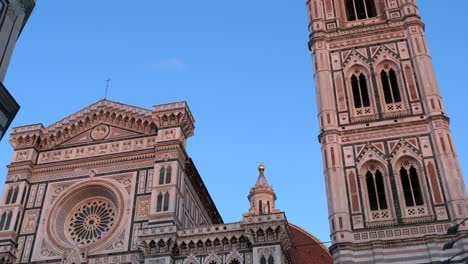 florence basilica dome and bell tower tilt up, evening light