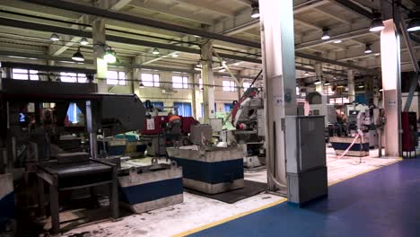 Factory Interior with Machinery and Workers