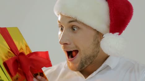 santa claus bodybuilder in christmas looking at camera santa claus bodybuilder in christmas looking at camera and showing his huge muscles isolated on a white background holiday mood concept