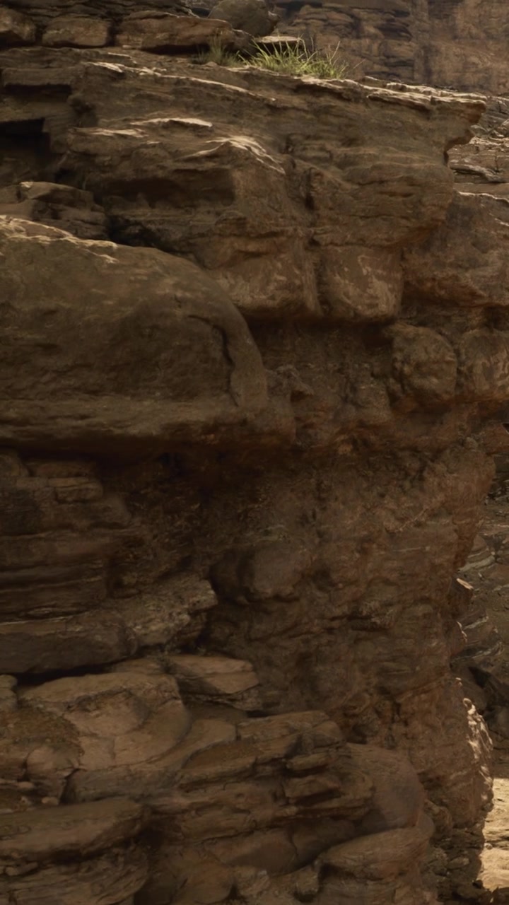 Experience the rugged beauty of rock formations in a serene canyon setting