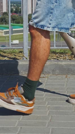 person with a prosthetic leg walking