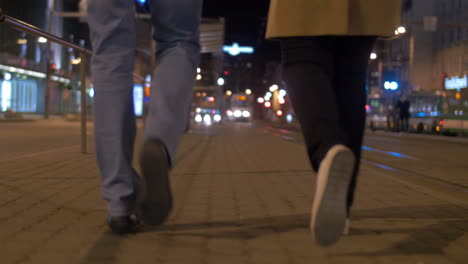 couple walking in the evening city