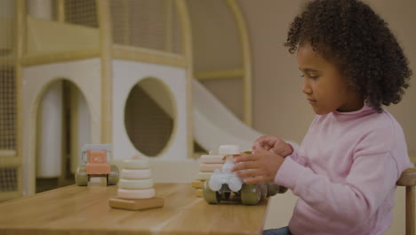 little girl in the playroom