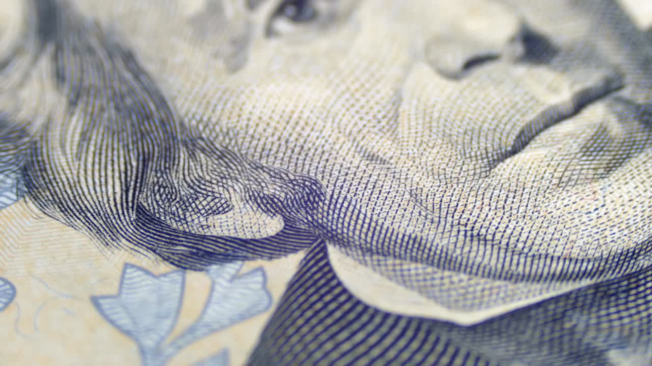 Slow Rotating Portrait of Andrew Jackson on Twenty Dollars Bill in Macro