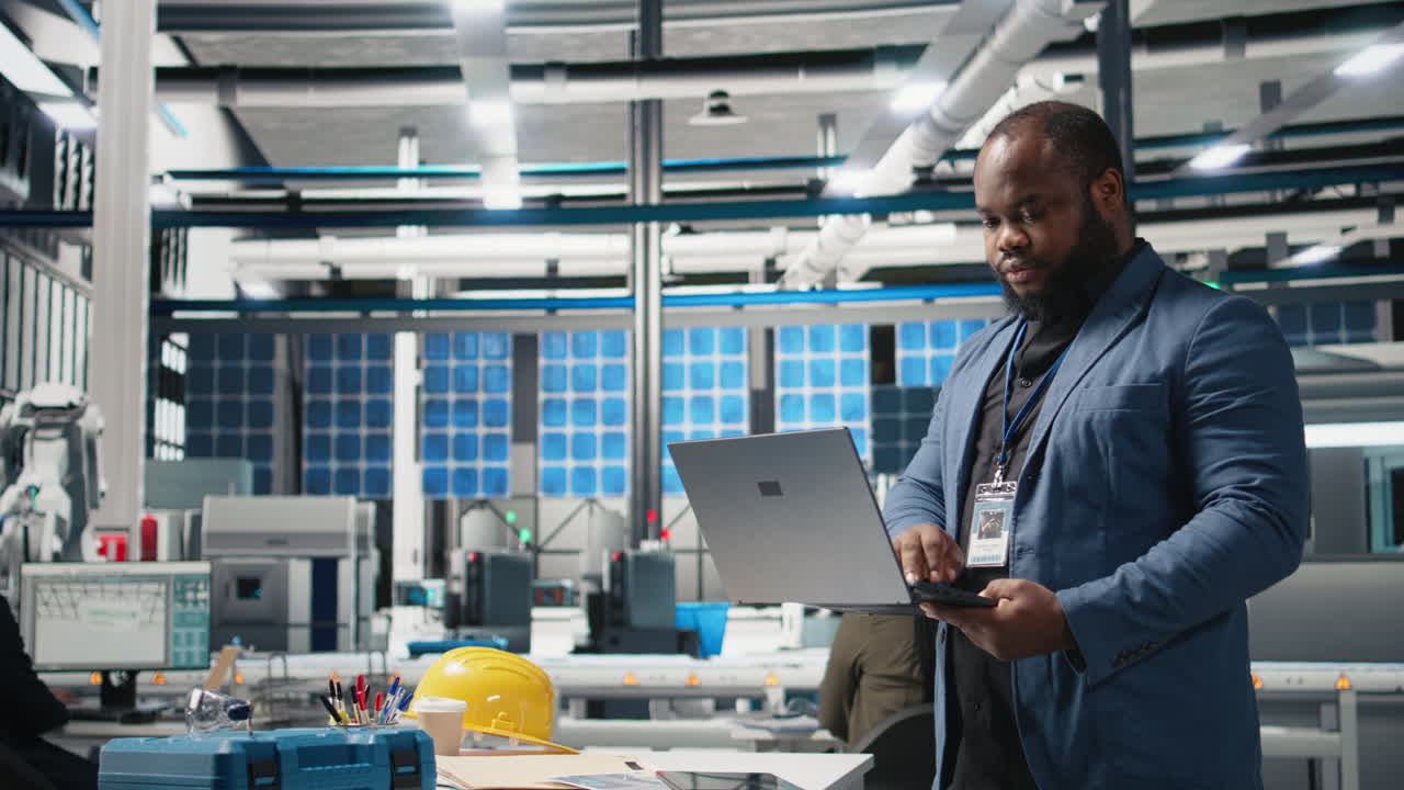 Engineers Working in a Modern Factory