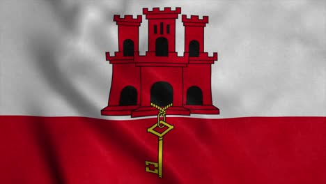la bandera nacional de gibraltar se agita en el viento
