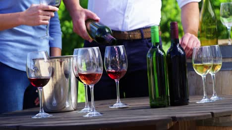 Happy-man-pouring-wine-in-glass