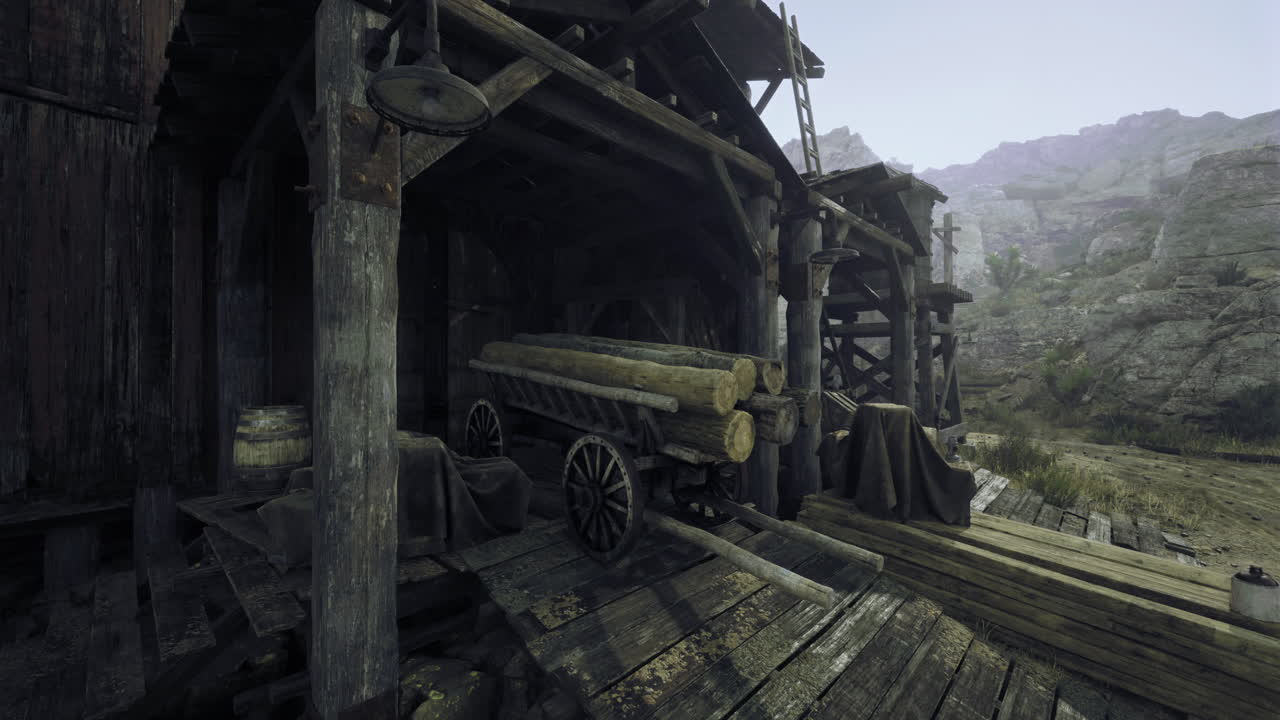 Rustic wood storage area nestled in a mountainous landscape during the day