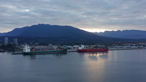Aerial-Drone-North-Vancouver-And-Harbour-At-Sunset,-British-Columbia,-Canada