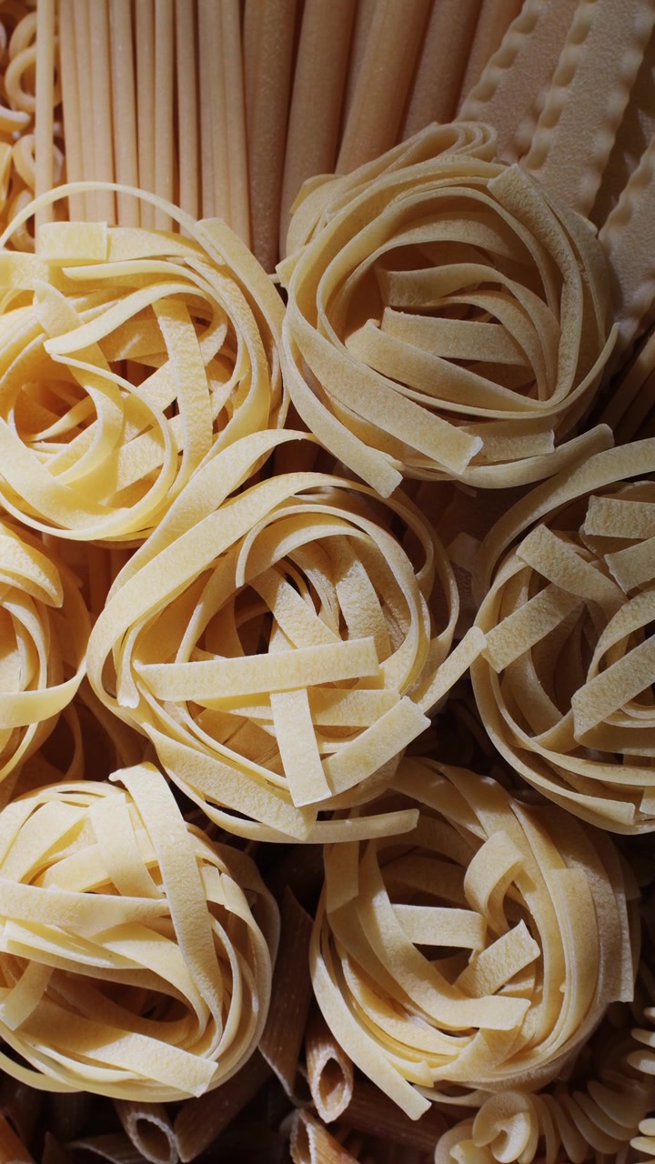 Close-up View of Various Dry Italian Pasta Shapes
