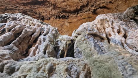 traveling vertically up geologic rock formations inside a cave