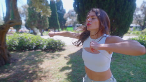 woman dancing in a park