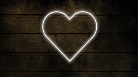animación del icono del corazón de neón brillante en la pared de ladrillo