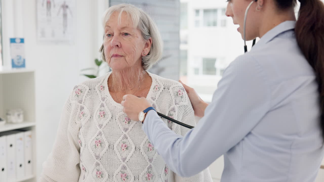 Woman, doctor and heart beat on elderly patient