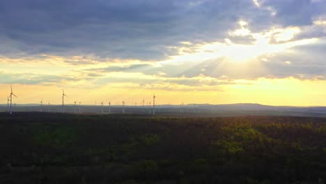 Dramatic-Sunrise-Sky-Illuminated-Over-Wind-Turbines