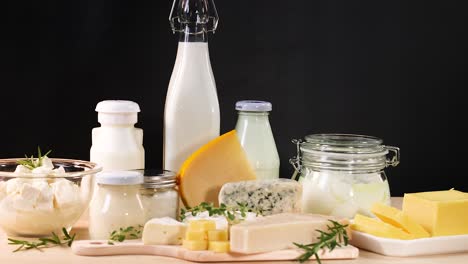 assorted dairy products on a black background