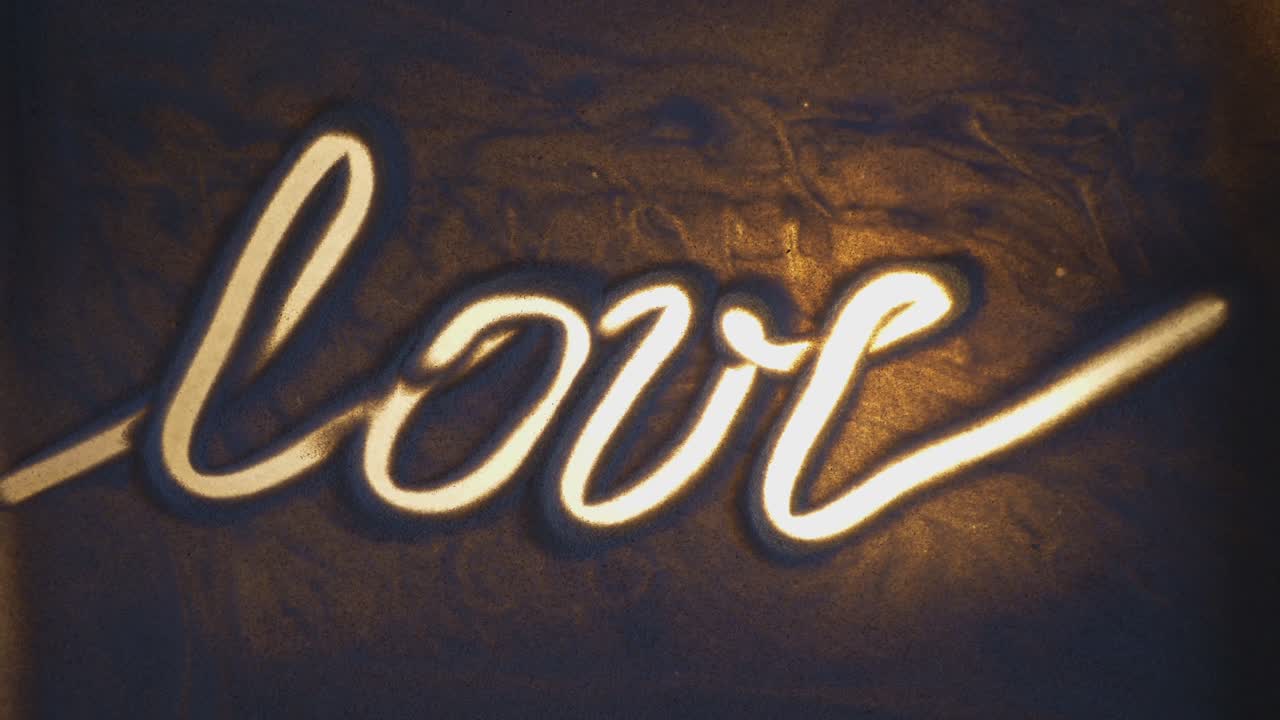 A Heart is Drawn With a Finger on a Love Note. Sand On Illuminated Glass