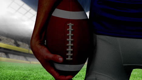 animation of midsection of american football player holding ball over sports stadium
