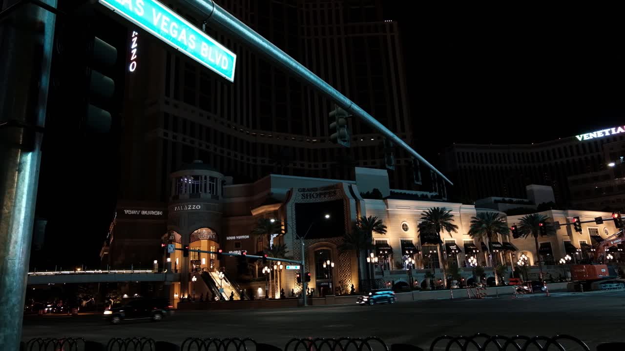 Las Vegas Boulevard Strip at Night During Coronavirus Pandemic Outbreak. Closed Palazzo and Venetian in Dark and Street Traffic