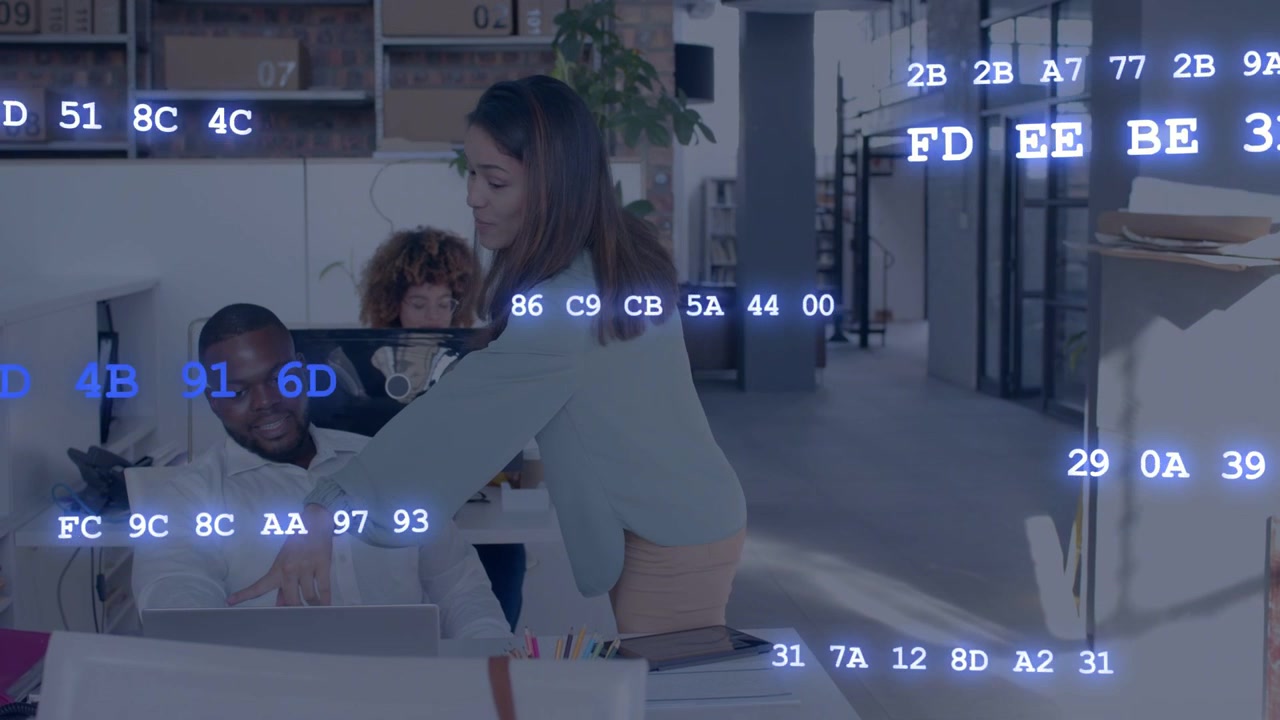 Standing woman touching laptop causing blue animated code overlay while team working on business