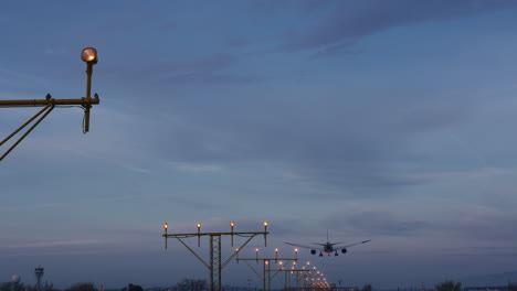 airplane landing at dusk