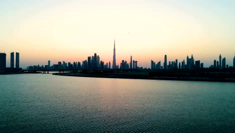 aerial view of a yacht in the bay of dubai during sunset, u.a.e.
