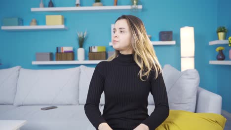 Aggressive-young-woman-having-a-nervous-breakdown-at-home.