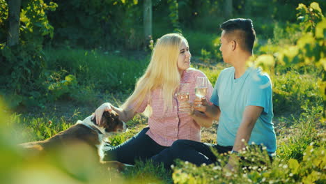 the family is resting near his vineyard with a dog small farm and rural business owners