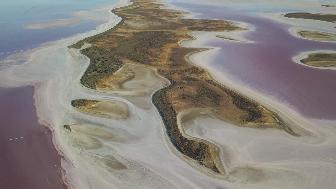 Drone panning down over beautiful pink Lake Tyrrell, Australia