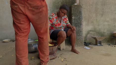 street-food-in-ghana-africa-preparing-together-outdoor-a-traditional-authentic-African-food-called-Fufu