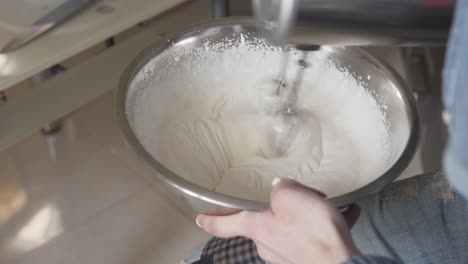 Close-up-scene-of-a-woman-making-whipped-cream