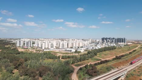 train on a bridge entering to southern district city at israel named by netivot