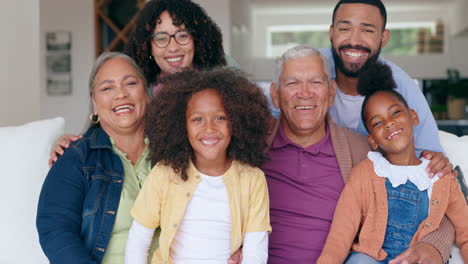 grandparents, parents and children on sofa