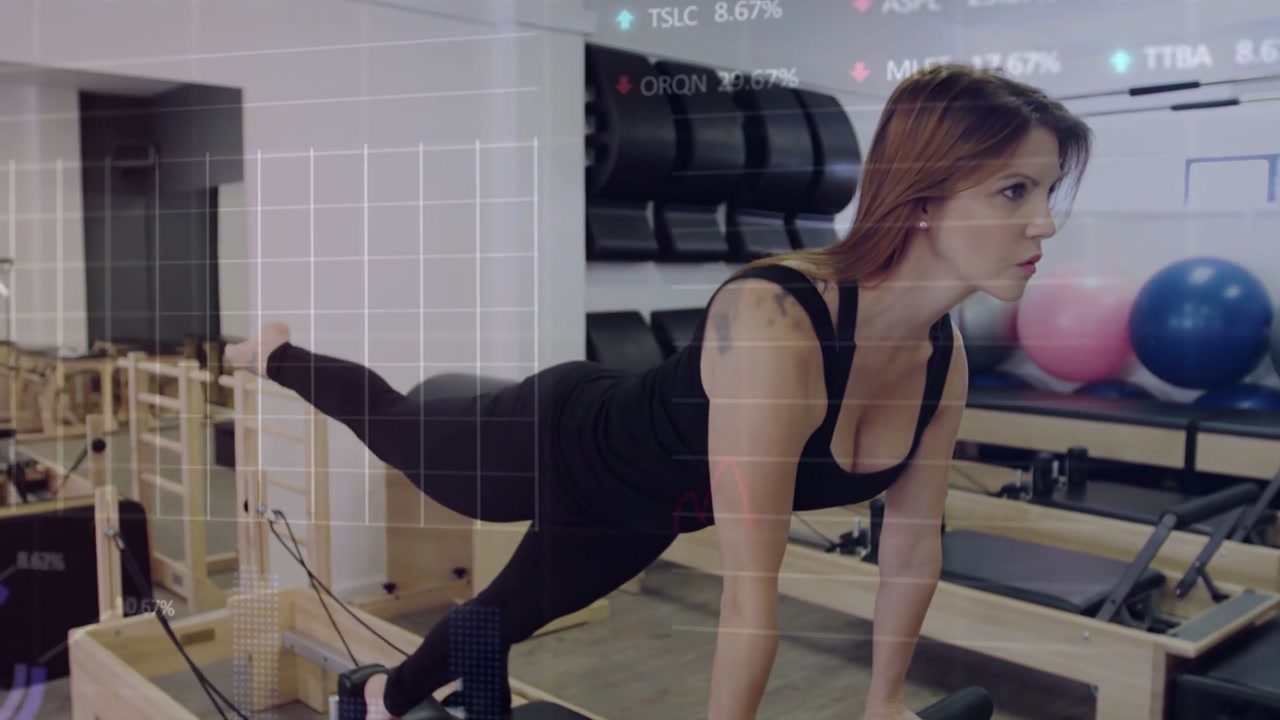 Pilates woman planting hands on reformer initiating leg lifting for core tone, HUD overlay hovering