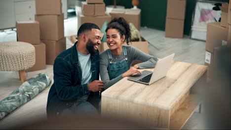 Couple moving into new home with boxes