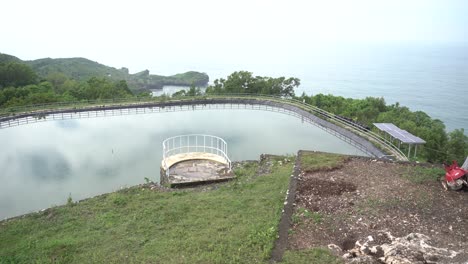 Beautiful-morning-view-of-the-Grigak-pond,-a-pond-on-the-edge-of-the-southern-sea-in-Gunung-Kidul-district,-Yogyakarta,-Indonesia