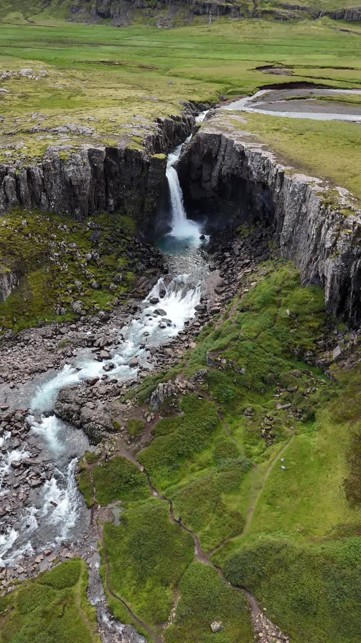 Aerial view flying towards the Folaldafoss Waterfall in Iceland.