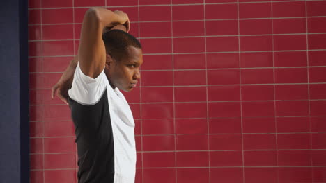 Young-Black-Man-Stretching-Before-Running-Outdoors-2