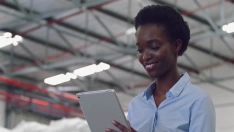 Young-female-manager-in-a-warehouse