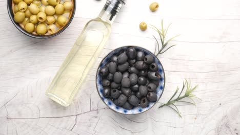 black and green olives with olive oil